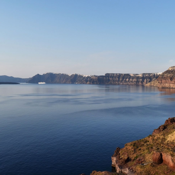 Caldera view of Santorini from Grand Ambassador hotel with cliffs and Aegean Sea