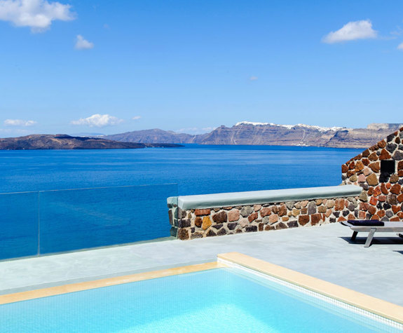 Grand Ambassador Santorini Hotel Infinity Cave Suite balcony, pool and sunbeds